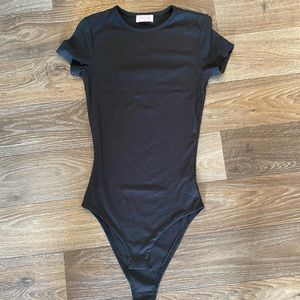 Pink Lily black ribbed bodysuit